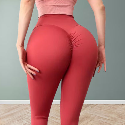 Femme montre leggings rouge