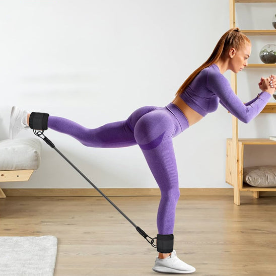 femme debout etire les jambes